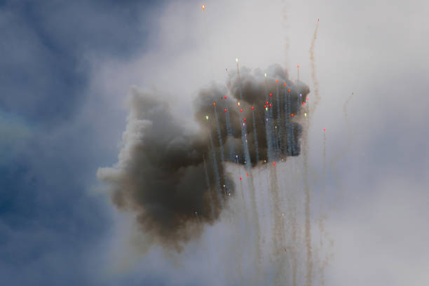 istock Day fireworks colorful clouds and bullets rising into the sky 1146899864