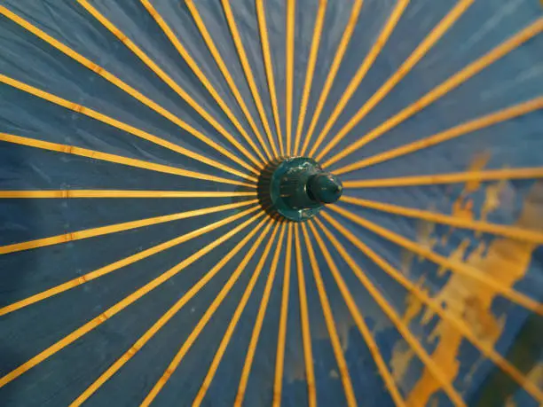 Photo of Umbrella surface looks like sunbeams in the blue sky