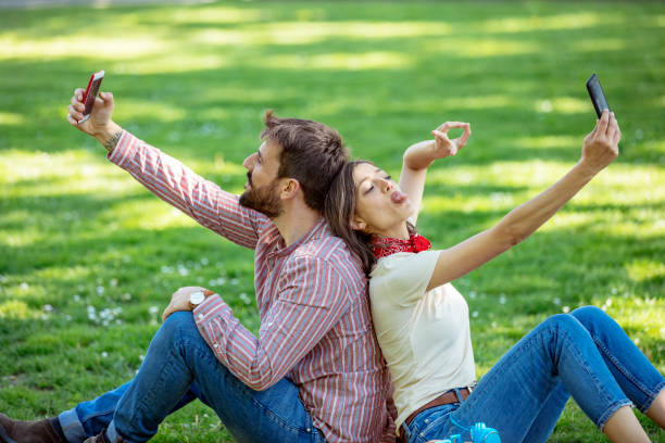 istock Young Attractive Couple is Having Fun in the Public Park 1146904452