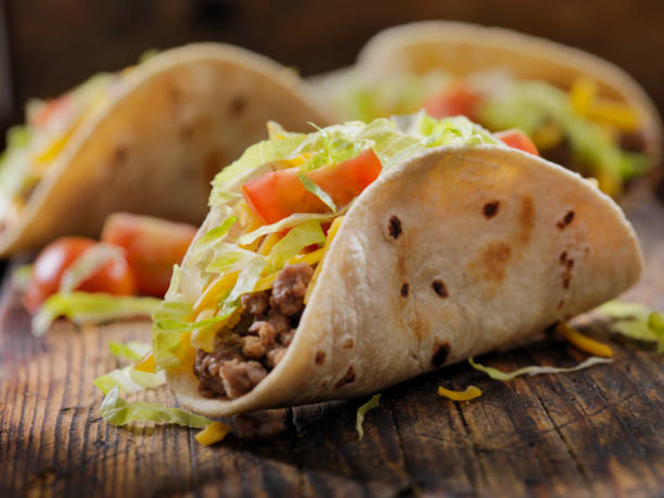 Small 4inch Soft Beef Tacos Small 4inch Soft Beef Tacos shredded photos stock pictures, royalty-free photos & images
