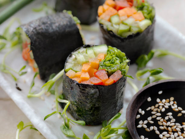 Seaweed Salad Rolls Seaweed Salad Rolls nori stock pictures, royalty-free photos & images