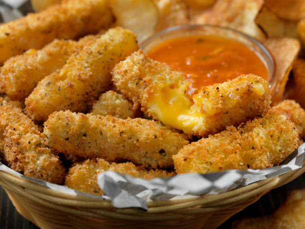 istock Breaded Cheddar Cheese Sticks with Marinara Dipping Sauce 1146907864