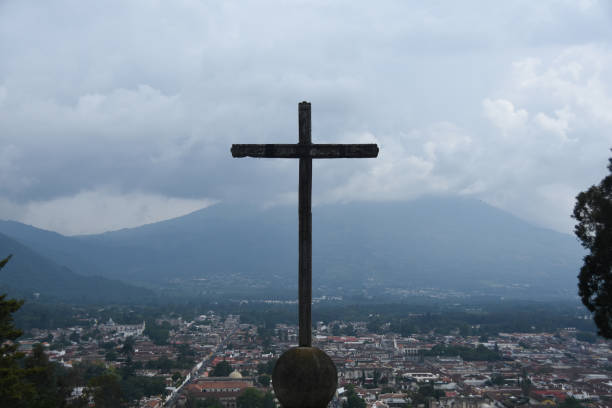 istock CROSS ON MOUNTAIN AGAINST SKY 1146909321