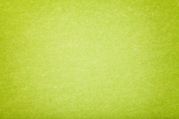 tejido de ante mate verde claro. textura de terciopelo de fieltro. - aceituna fotos fotografías e imágenes de stock