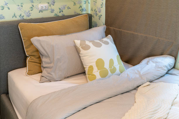 istock modern bedroom with set of pillows 1146913888