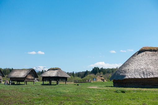 May 2019-Aomori, JAPAN: Reconstructed of houses during Jomon Period at Sannai Maruyama Archeological Site.Many pit buildings, pillar-supported buildings,mounds, and burial pits and jars were unearthed