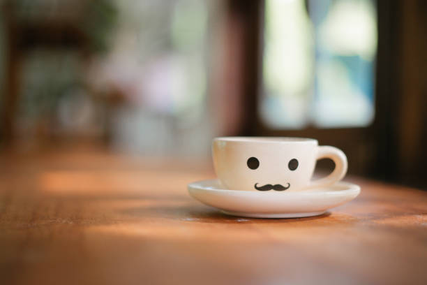 istock small ceramic pot on wooden table with sun light 1146918312