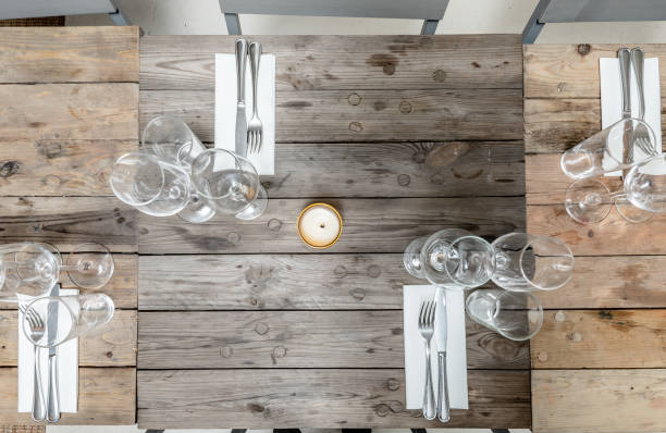 istock table set on dining table with wooden chairs. 1146921133
