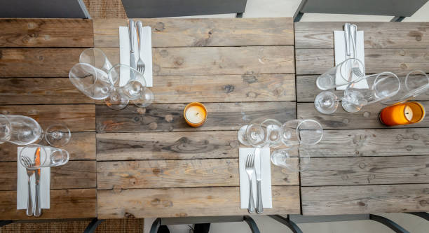 istock table set on dining table with wooden chairs. 1146921169