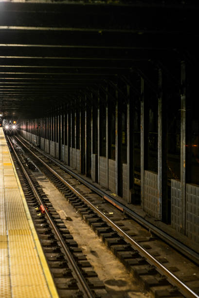 istock Train approaching in the subway station in Manhattan 1146922333