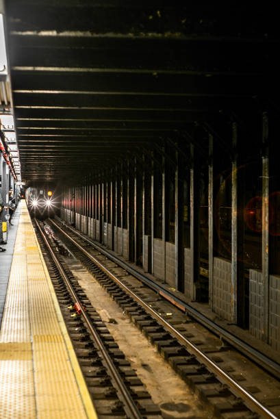 istock Train approaching in the subway station in Manhattan 1146922335