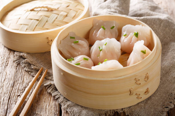 istock Steamed shrimp dumplings dim sum  close-up. horizontal 1146922885