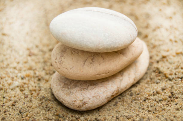 istock Zen stones on the beach for a perfect meditation, a blurred background 1146923634