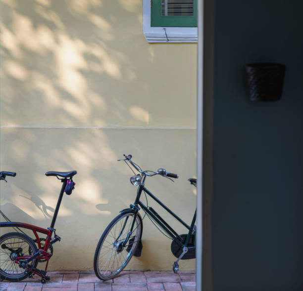 istock bicycle on wall background, vintage style 1146925195