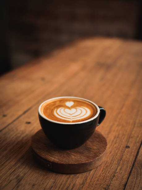 coffee latte on the wood desk in cafe
