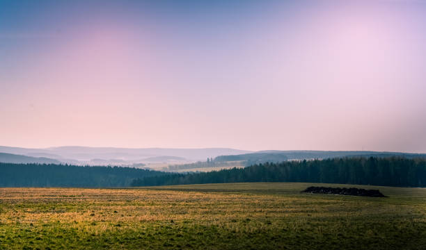 istock landscape with field and clear evening sky 1146931515
