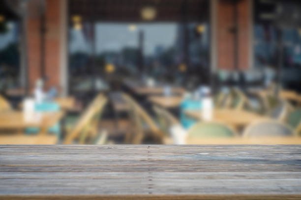istock image of wooden table in front of abstract blurred background 1146933593