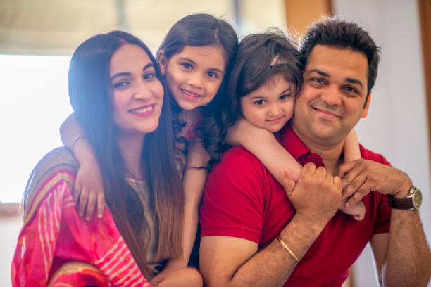istock Indian Family Laughing Together 1146933732