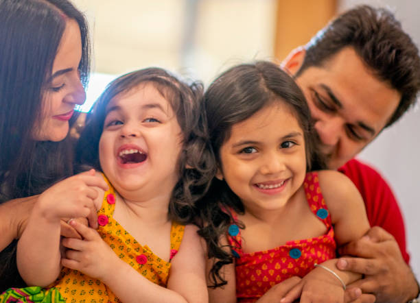 istock Indian Family Laughing Together 1146933746