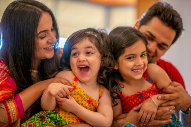 istock Indian Family Laughing Together 1146933754