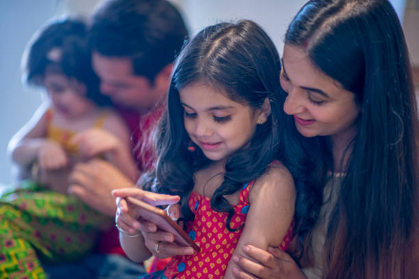 istock Indian Family Laughing Together 1146933784