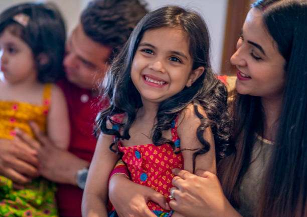 istock Indian Family Laughing Together 1146933789
