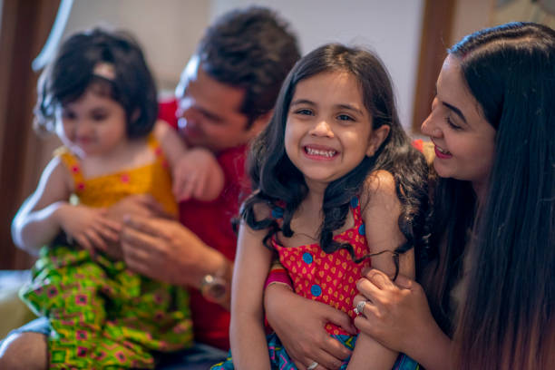 istock Indian Family Laughing Together 1146933798
