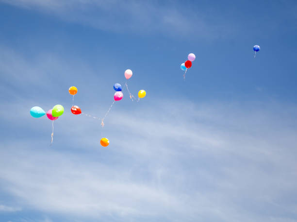 istock balloons in the sky. Multicolored balloons 1146935618