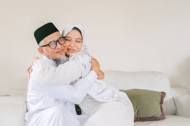 istock Father and Daughter Celebrate Eid Mubarak Together 1146943283