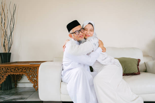 istock Father and Daughter Celebrate Eid Mubarak Together 1146943308