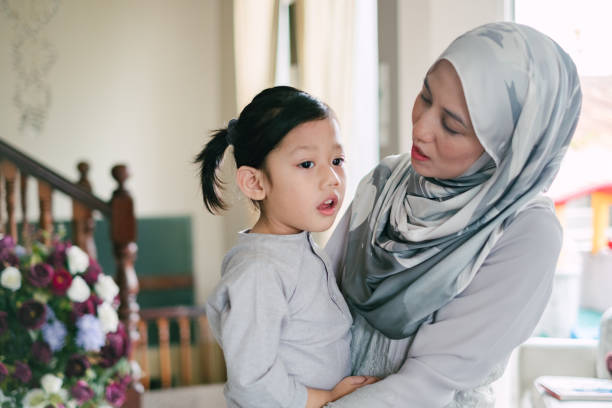 istock Young Beautiful Mother with Her Daughter During Eid Mubarak 1146945055
