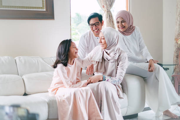 Hari Raya Celebration with Family Hari Raya Aidilfitri Celebration in Malaysia hijab photos stock pictures, royalty-free photos & images