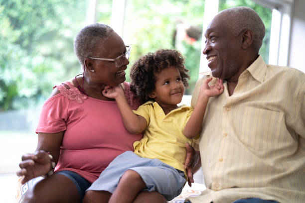 istock Grandson demonstrating affection to grandparents 1146946306