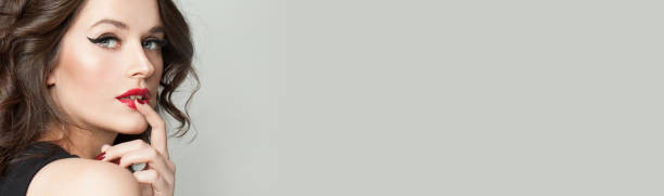 istock Perfect woman with makeup on gray banner background 1146947340