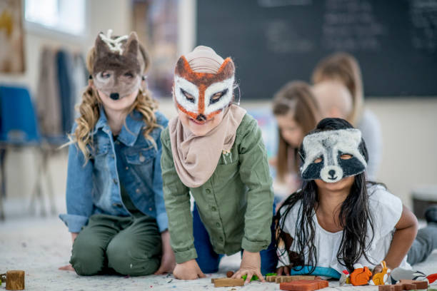 istock Friends playing in masks 1146947686