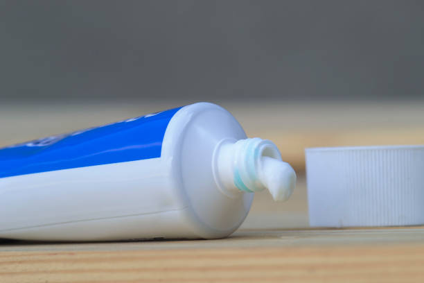 istock A tube of toothpaste on a wooden table. 1146948968