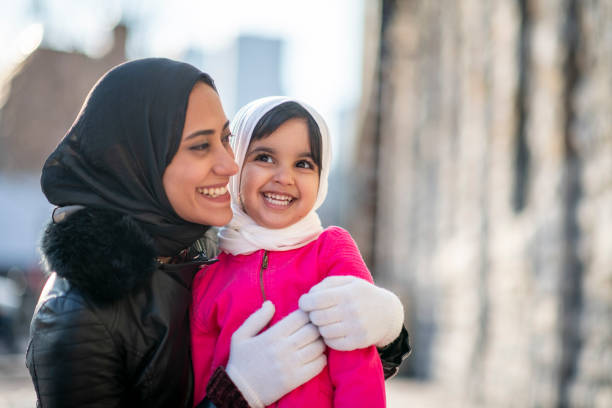 istock Muslim mother hugging daughter 1146951442