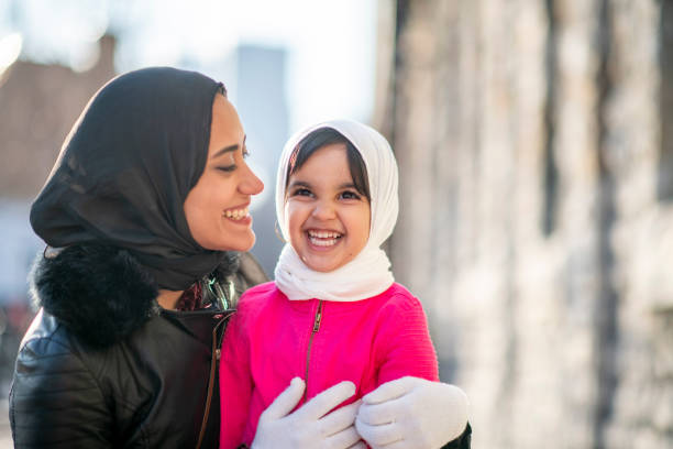 istock Muslim mother hugging daughter 1146951446