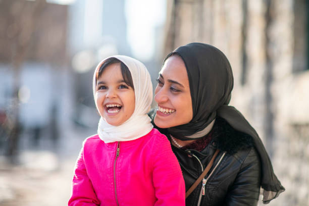istock Muslim mother hugging daughter 1146951454