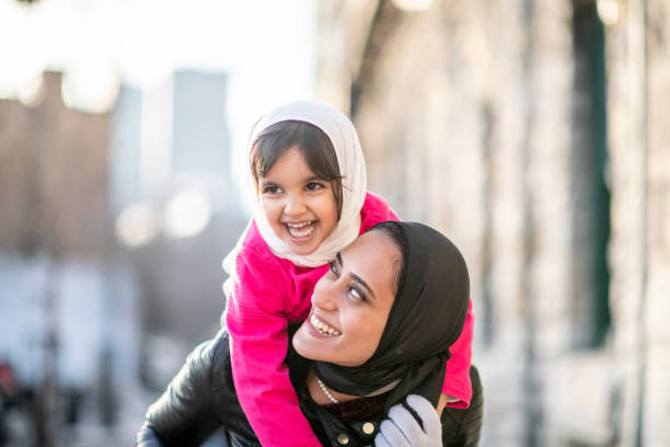 istock Muslim mother piggyback 1146951464