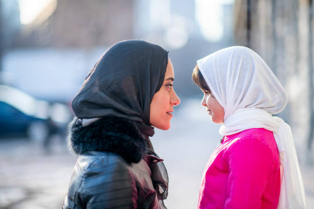 istock Muslim mother hugging daughter 1146951465