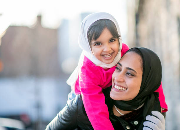 istock Muslim mother piggyback 1146951979