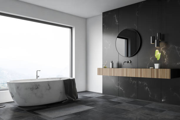 istock White and black marble bathroom corner, tub, sink 1146952758