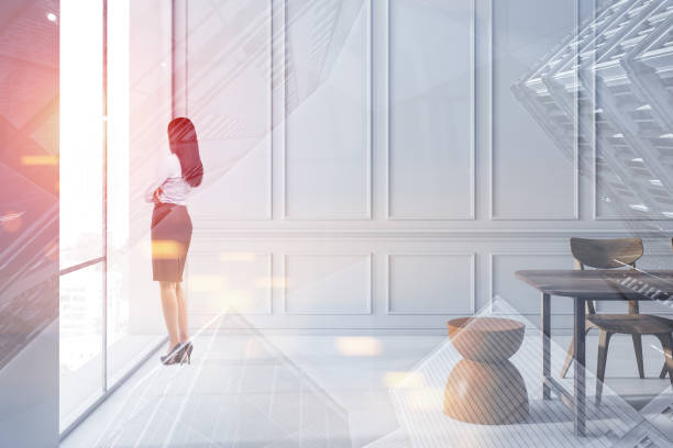 istock Woman looking in white dining room window 1146953811
