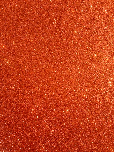 istock Orange glitter texture and shiny sparkle Christmas abstract background 1146955617