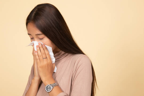 istock Young Asian woman got sick and flu. 1146956119