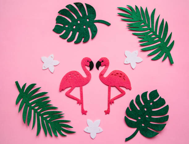 istock Flamingo and leaves on a pink background. Summer design 1146957371