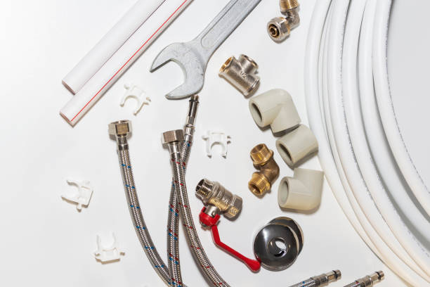 istock plumbing tools and equipment on white with copy space 1146957983