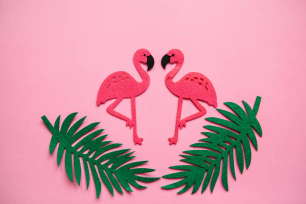istock Flamingo and leaves on a pink background. Summer design 1146958693