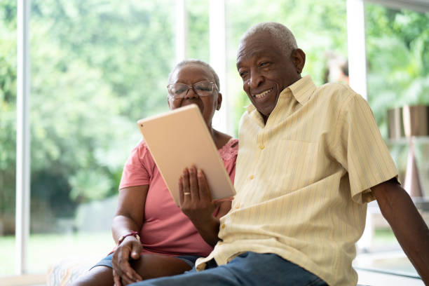 istock African senior couple using digital tablet 1146961293